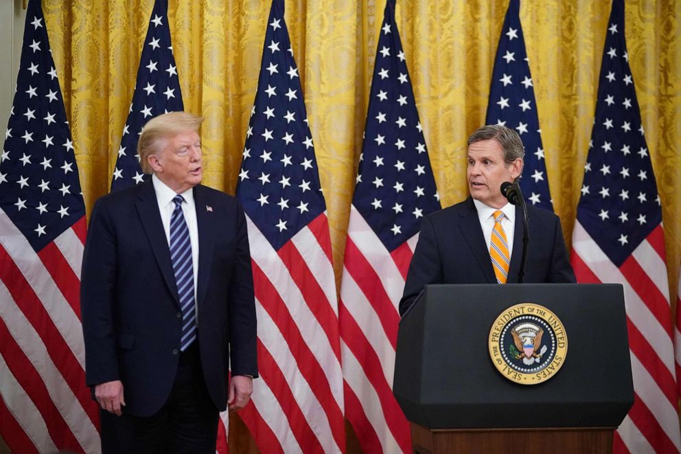 PHOTO: President Donald Trump listens as Tennessee Governor Bill Lee speaks on protecting Americas seniors from the COVID-19 pandemic in the East Room of the White House in Washington, April 30, 2020.