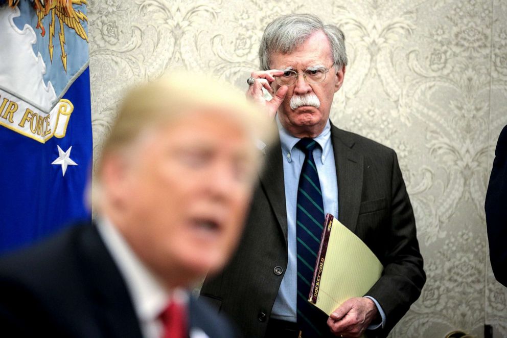 PHOTO: National security advisor, John Bolton, right, attends a meeting with President Donald Trump in the Oval Office of the White House on Sept. 28, 2018, in Washington, D.C.