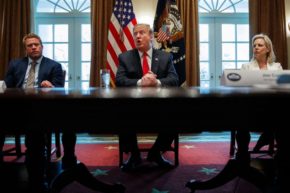 PHOTO: Timothy Ballard, CEO of Operation Underground Railroad and Secretary of Homeland Security Kirstjen Nielsen listen as President Trump speaks during an event on human trafficking in the Cabinet Room of the White House, Feb. 1, 2019, in Washington.