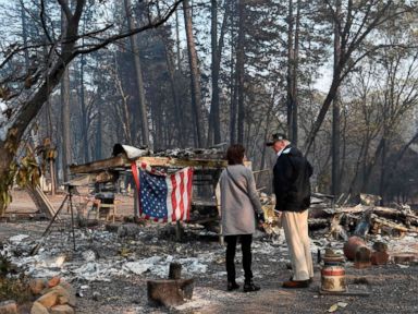 PHOTO: President Donald Trump views damage from wildfires in Paradise, Calif., Nov. 17, 2018.