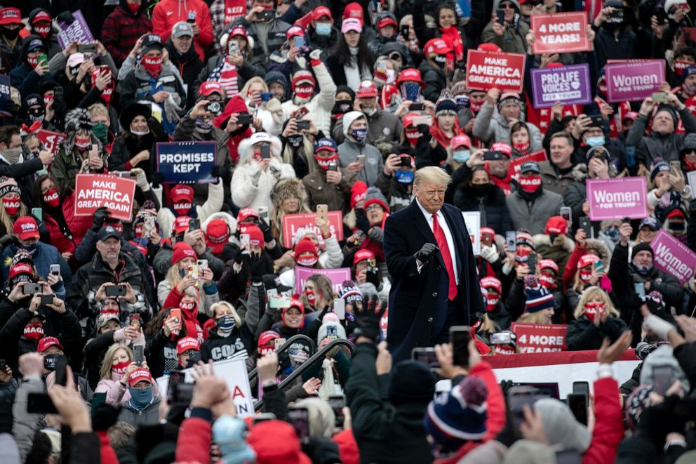 PHOTO: President Donald Trump greets supporters at a campaign rally at Oakland County International Airport on October 30, 2020 in Waterford, Mich., Oct. 30, 2020.