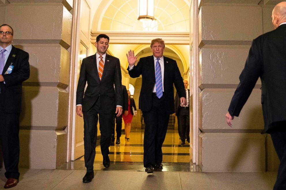 PHOTO: President Donald Trump, accompanied by House Speaker Paul Ryan, R-WI, arrive for a meeting with Republican members of Congress at the Capitol in Washington, on June 19, 2018.