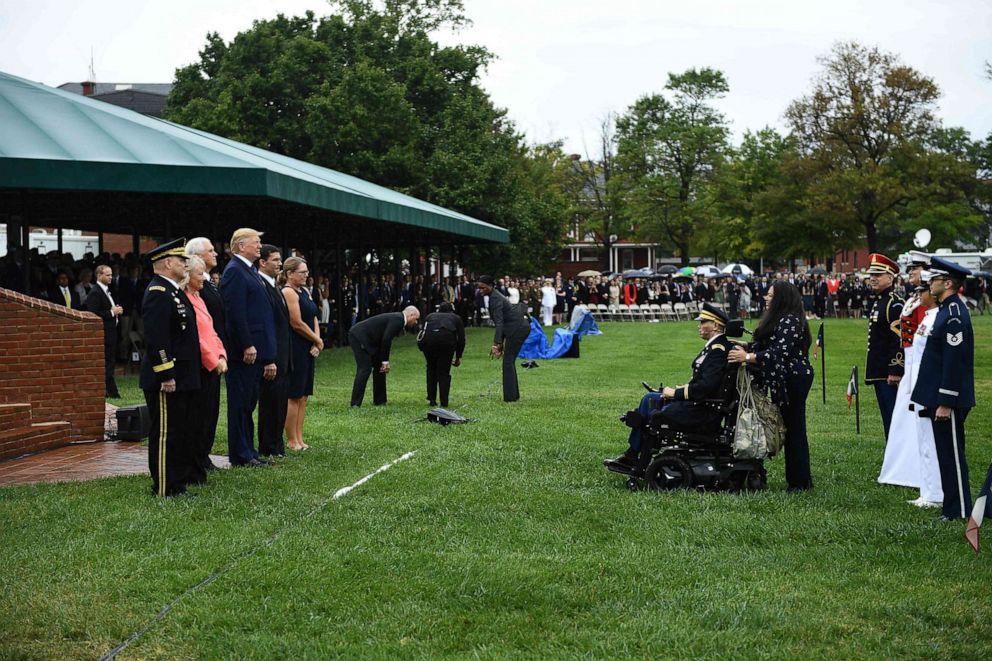 PHOTO: President Donald Trump, Vice President Mike Pence and US Army Chief of Staff Gen. Mark Milley recognize Army Captain Luis Avila (in wheelchair), during the Armed Forces Welcome Ceremony, Sept. 30, 2019, at Joint Base Myer-Henderson Hall, Virginia.