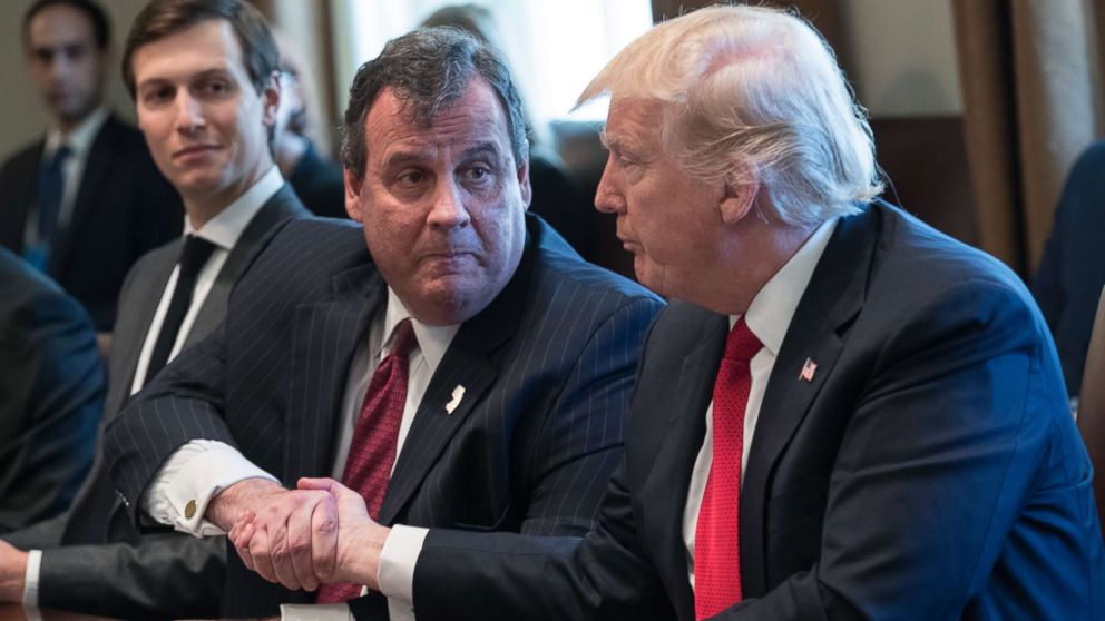 President Donald Trump, left, shakes hands with New Jersey Gov. Chris Christie at a panel discussion on an opioid and drug abuse in the Roosevelt Room of the White House March 29, 2017. 