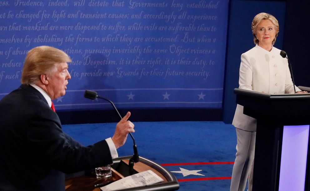 PHOTO: Hillary Clinton looks on as Donald Trump speaks during the final presidential debate at the Thomas & Mack Center on the campus of the University of Las Vegas in Las Vegas, Oct.19, 2016.