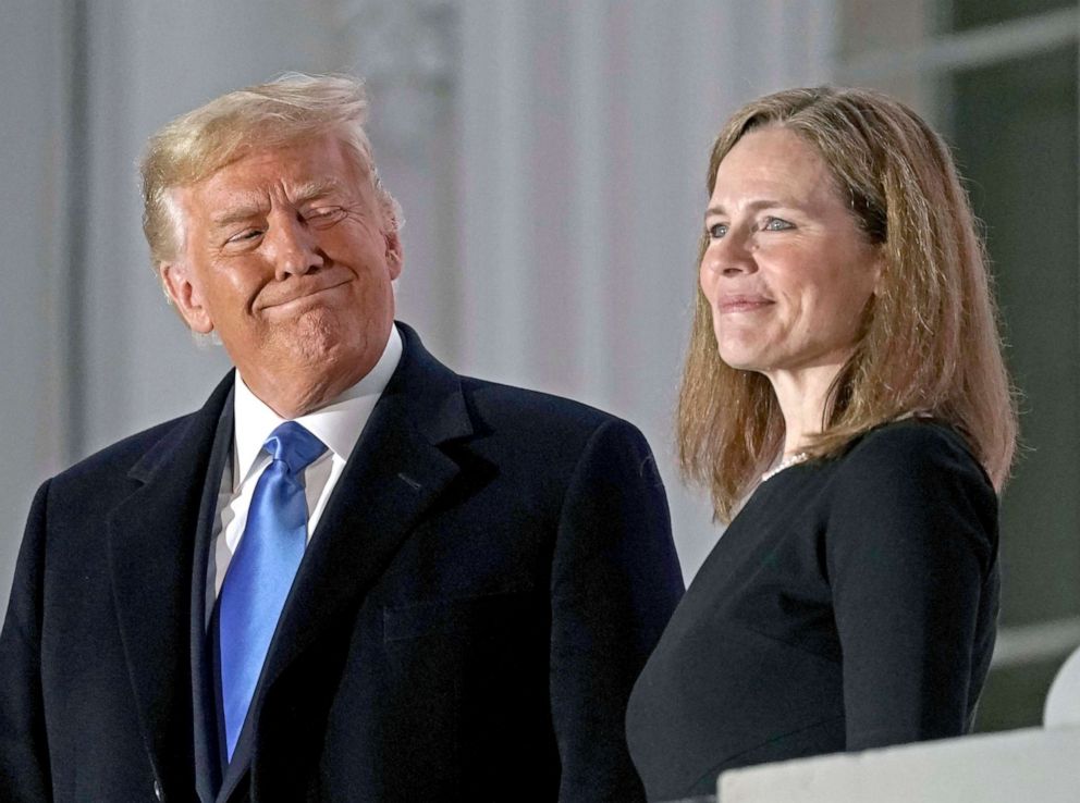 PHOTO: President Donald Trump, left, and Amy Coney Barrett, associate justice of the U.S. Supreme Court, during a ceremony on the South Lawn of the White House in Washington, D.C., Oct. 26, 2020.