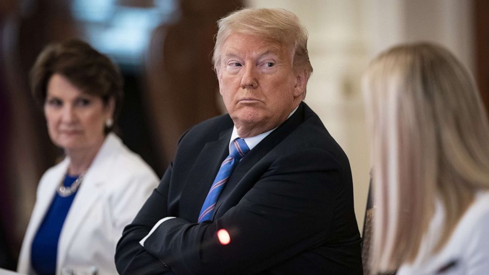 PHOTO: U.S. President Donald Trump listens during an American Workforce Policy Advisory Board meeting in the East Room of the White House in Washington, D.C., June 26, 2020.