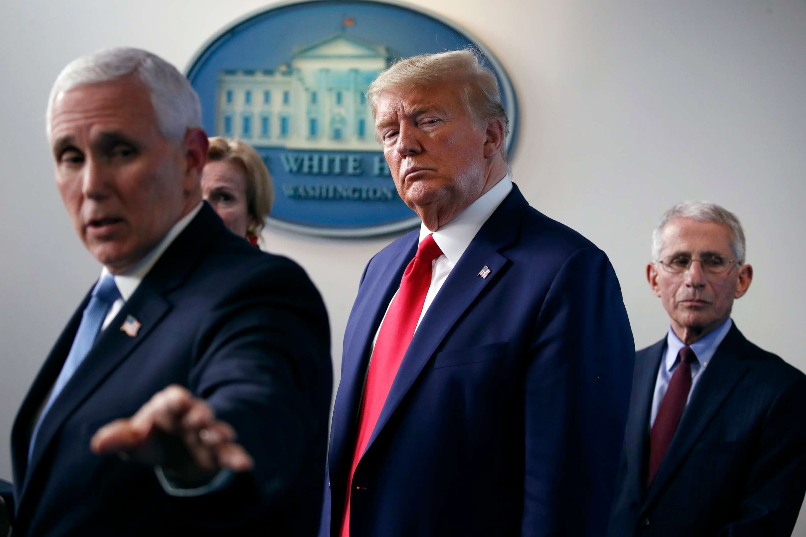 PHOTO: Vice President Mike Pence gestures to a monitor as he speaks about the coronavirus in the James Brady Press Briefing Room of the White House, March 31, 2020.