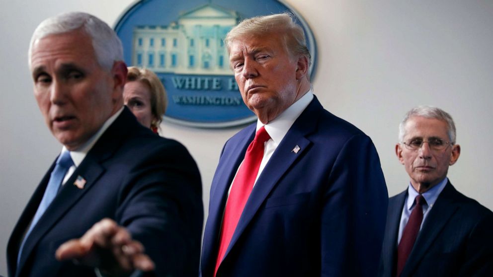 PHOTO: Vice President Mike Pence gestures to a monitor as he speaks about the coronavirus in the James Brady Press Briefing Room of the White House, March 31, 2020.