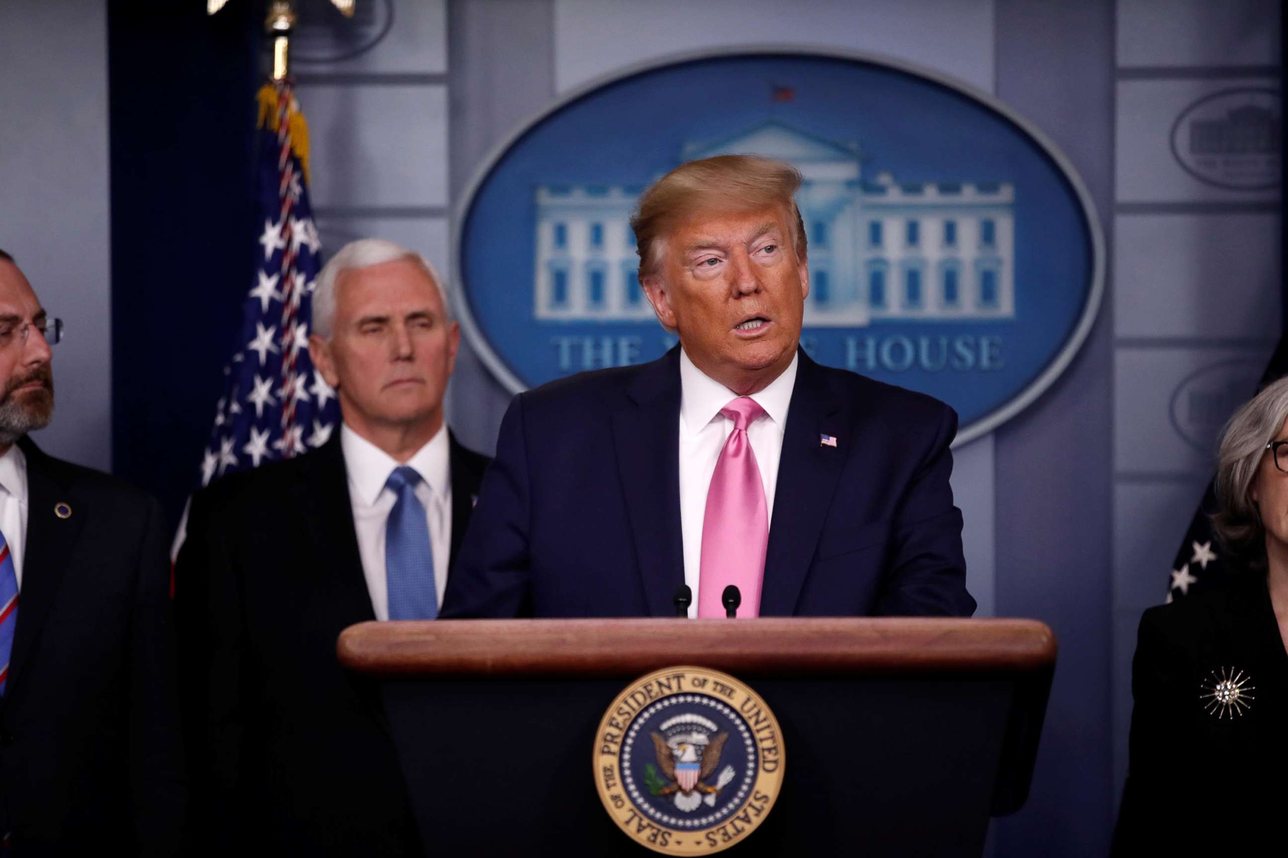 PHOTO: President Donald Trump stands with Vice President Mike Pence and members of his coronavirus task force during a news conference at the White House in Washington, Feb. 26, 2020.  
