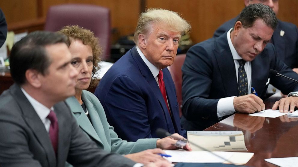 PHOTO: Former President Donald Trump sits at the defense table with his defense team in a Manhattan court, April 4, 2023, in New York.