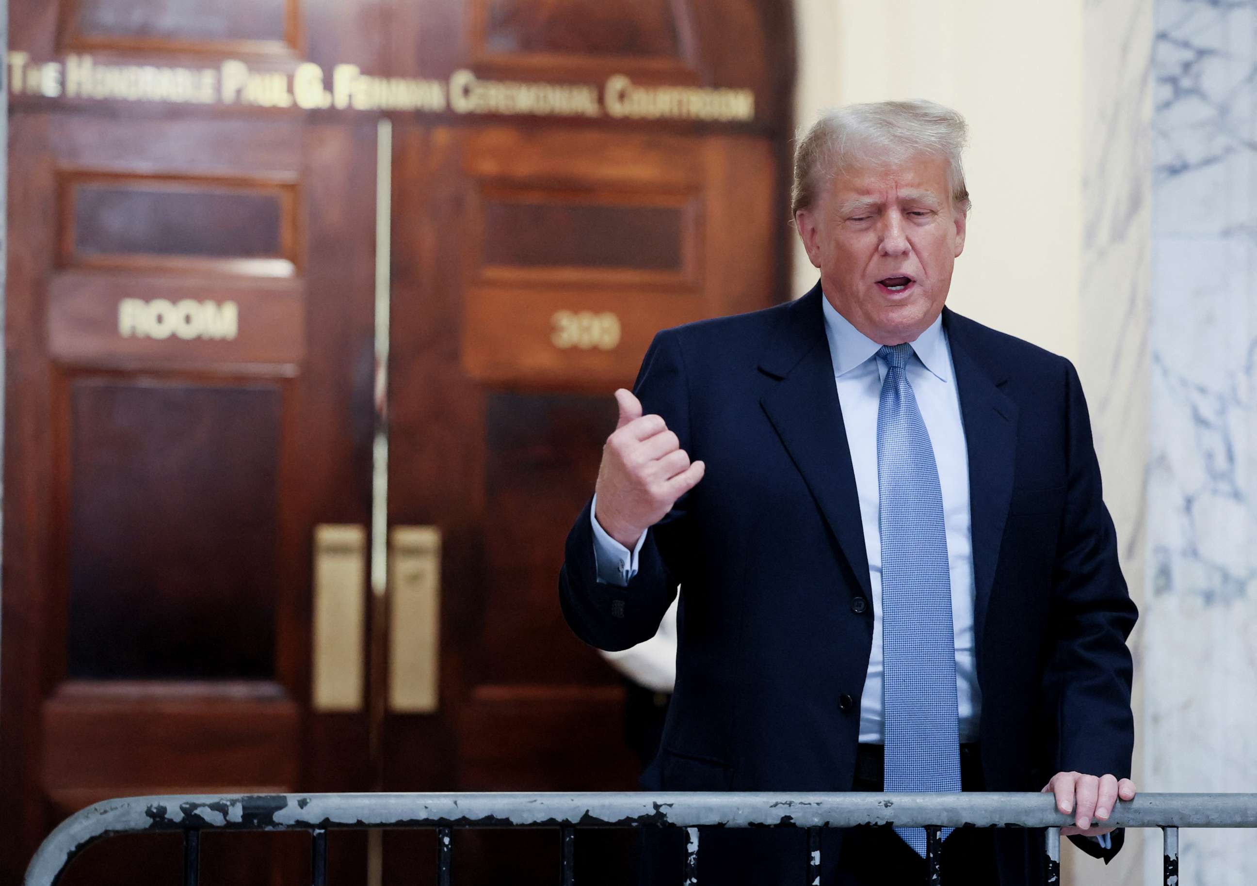 PHOTO: Former U.S. President Donald Trump delivers remarks after exiting the courtroom as he attends his Manhattan courthouse trial in a civil fraud case in New York, Oct. 18, 2023.