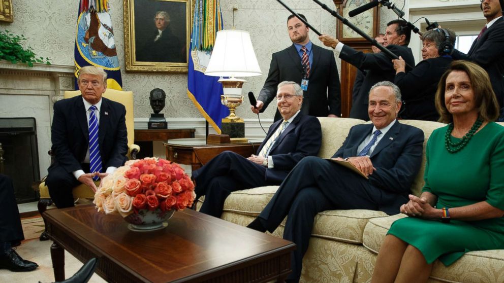 President Donald Trump meets with, from left, Senate Majority Leader Mitch McConnell, Senate Minority Leader Chuck Schumer, D-N.Y., and House Minority Leader Nancy Pelosi, D-Calif., and other Congressional leaders in the Oval Office, Sept. 6, 2017, in Washington.