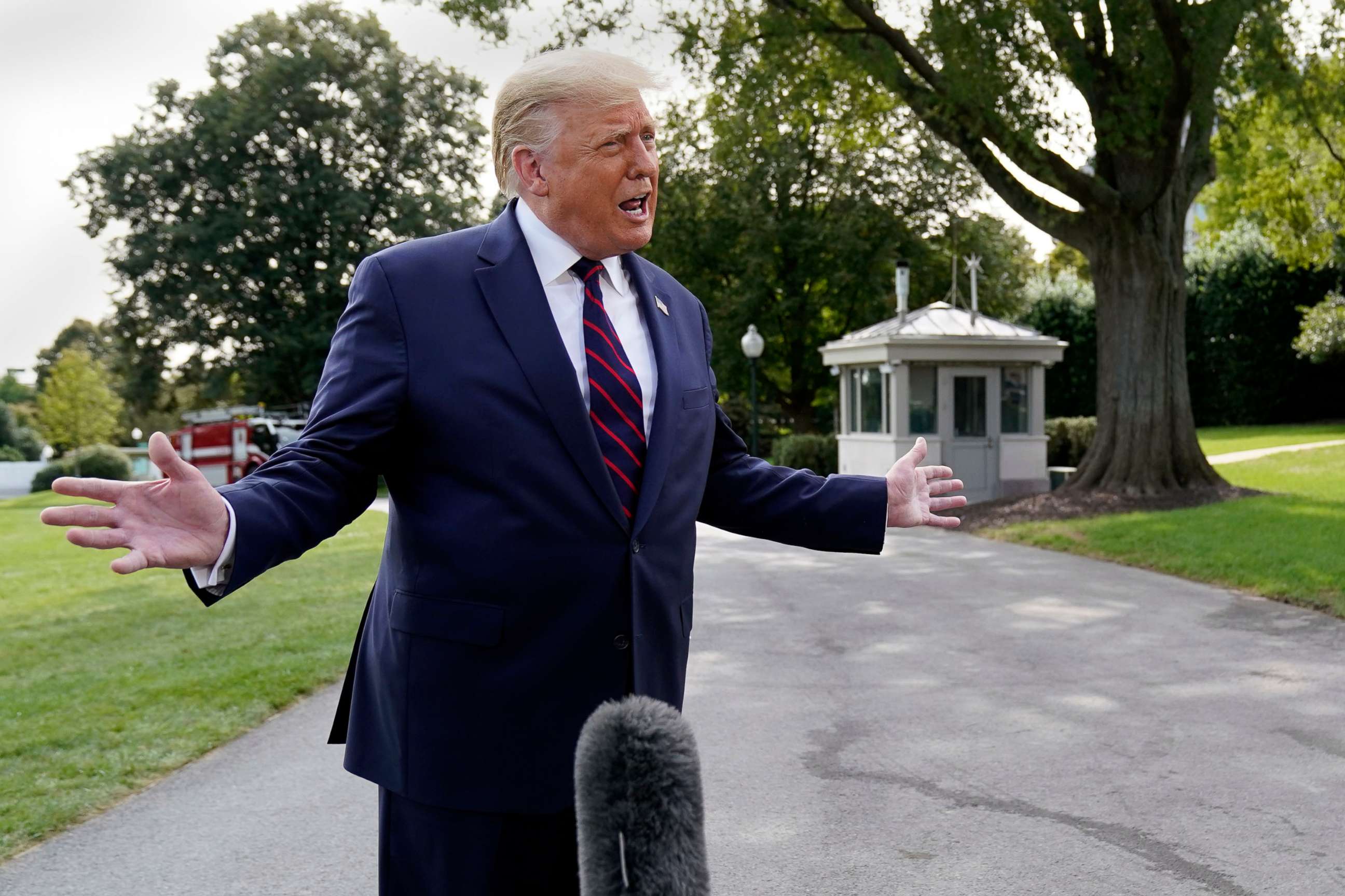 PHOTO: President Donald Trump speaks with reporters as he walks to Marine One on the South Lawn of the White House, Sept. 15, 2020, en route to participate in a town hall event in Philadelphia.