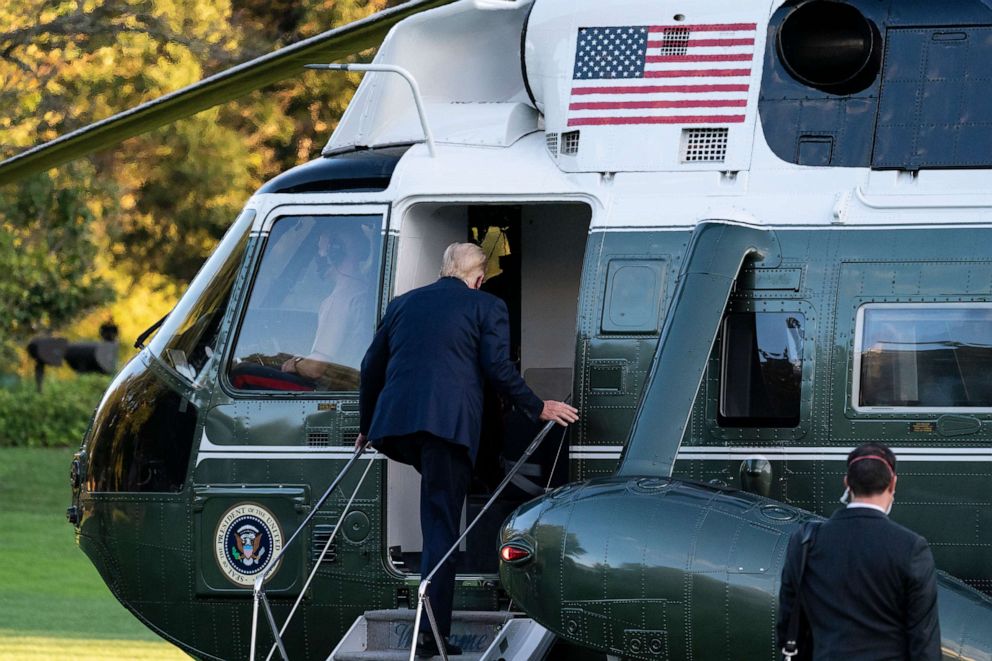 PHOTO: President Donald Trump boards Marine One as he leaves the White House to go to Walter Reed National Military Medical Center after he tested positive for COVID-19, Oct. 2, 2020, in Washington.