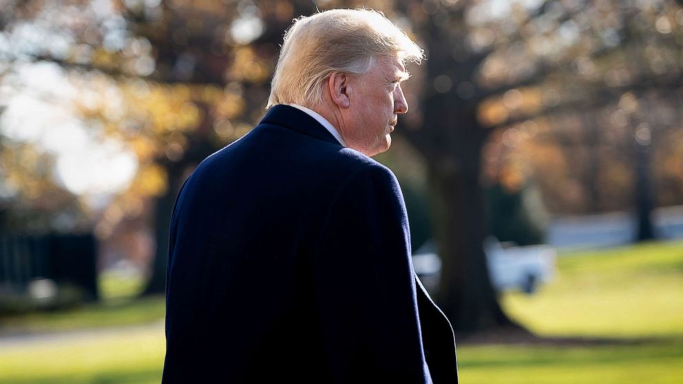 PHOTO: President Donald Trump walks to Marine One prior to departing from the South Lawn of the White House for a trip to Kansas City, Mo., Dec. 7, 2018.