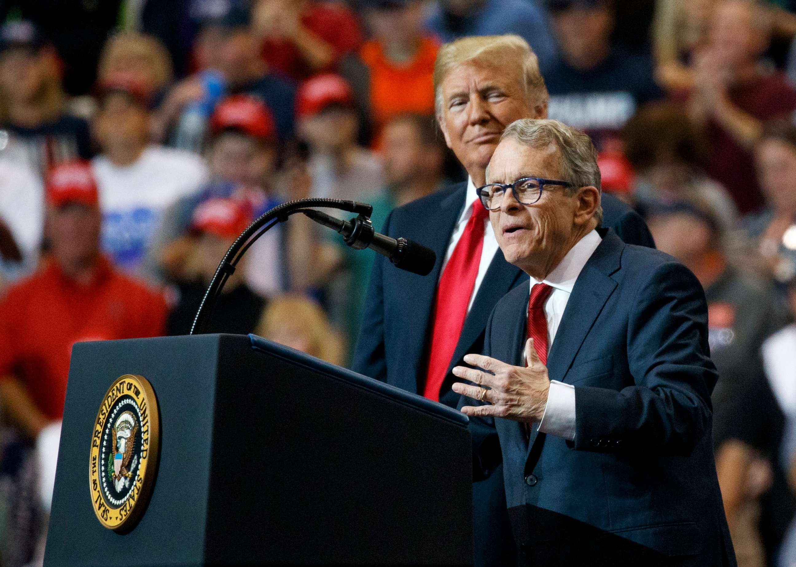 PHOTO: President Donald Trump stands with gubernatorial candidate Mike DeWine as he speaks during a rally in Cleveland, Ohio, Nov. 5, 2018.