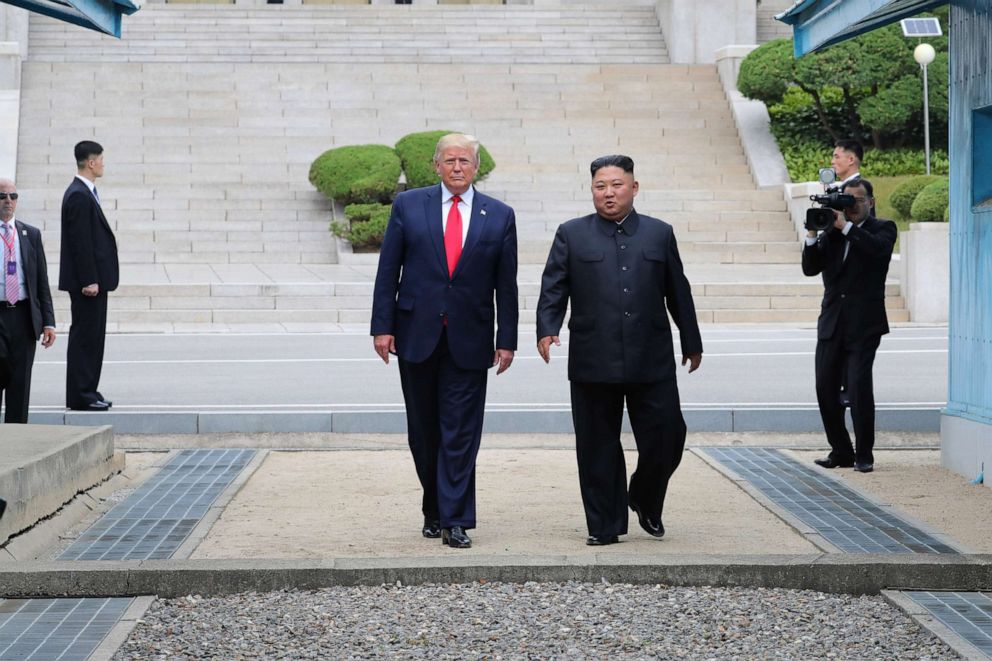 PHOTO: North Korean leader Kim Jong Un and President Donald Trump inside the demilitarized zone (DMZ) separating the South and North Korea, June 30, 2019. 