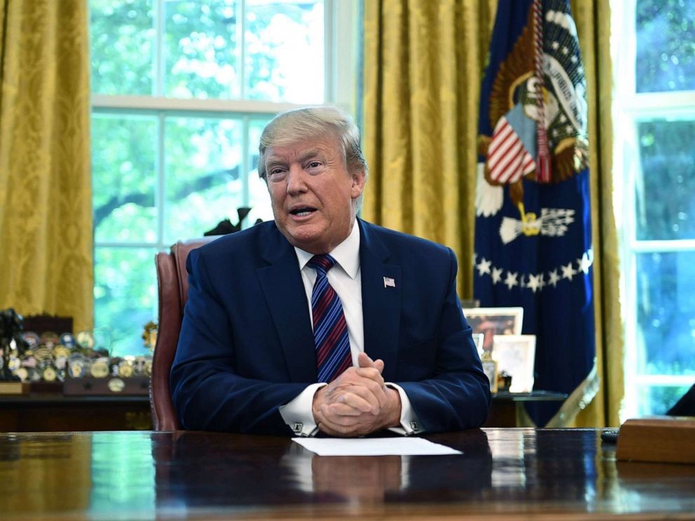 PHOTO: President Donald Trump speaks to the media in the Oval Office of the White House, July 26, 2019.