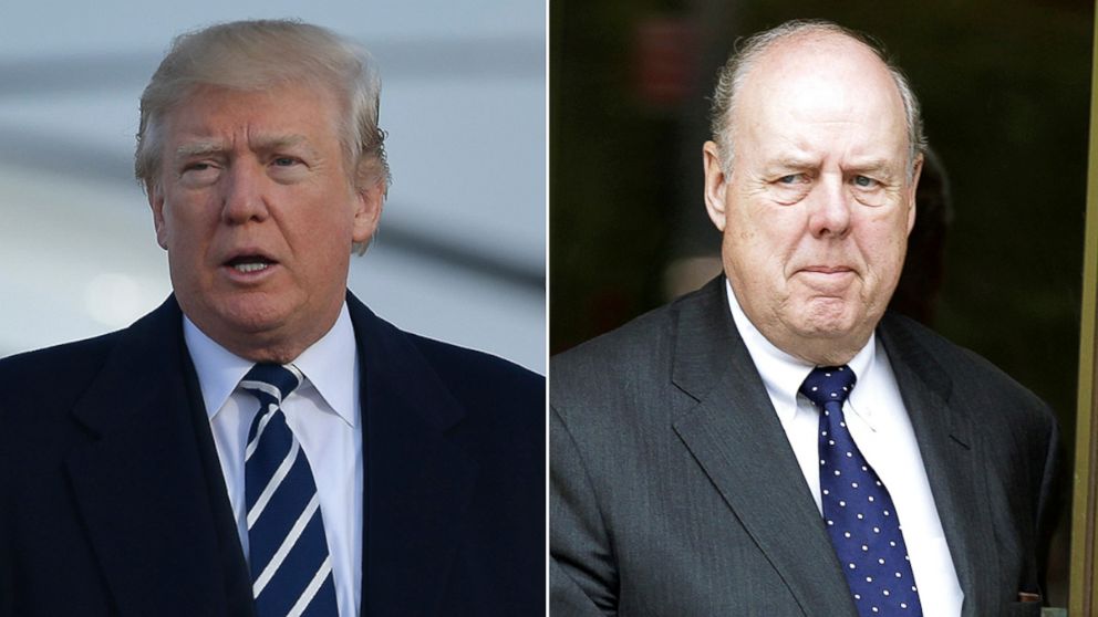 President Donald Trump makes his way to board Air Force One before departing from Andrews Air Force Base in Maryland, Dec. 2, 2017. awyer John Dowd exits Manhattan Federal Court in New York, May 11, 2011.