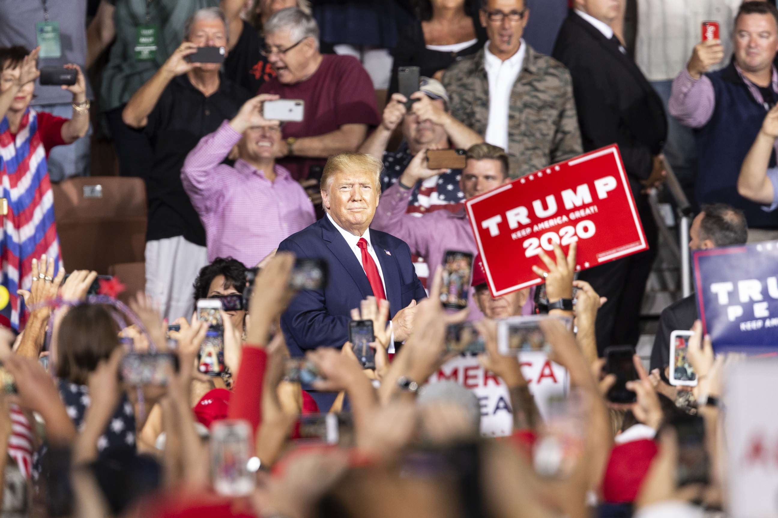 PHOTO: President Donald Trump greets supporters during campaign MAGA (Make America Great Again) rally at Southern New Hampshire University Arena, in Manchester, N.H. on Aug. 15, 2019.