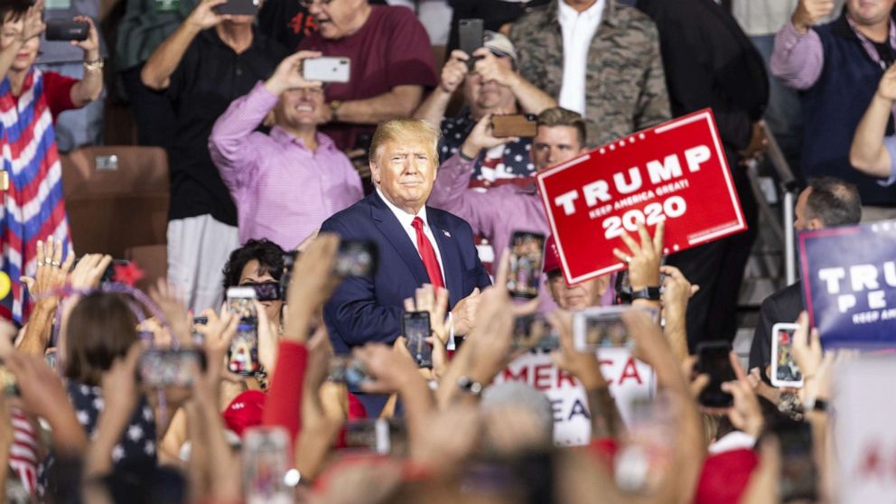 PHOTO: President Donald Trump greets supporters during campaign MAGA (Make America Great Again) rally at Southern New Hampshire University Arena, in Manchester, N.H. on Aug. 15, 2019.