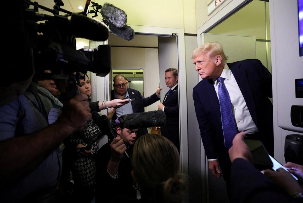 PHOTO: President Donald Trump speaks to reporters aboard Air Force One on his return to Washington, D.C., U.S., March 16, 2025.