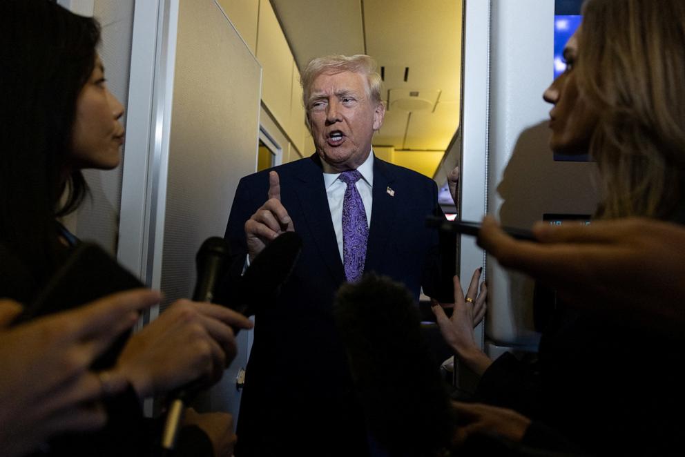 PHOTO: President Donald Trump speaks to reporters during travel to Washington, D.C., from Palm Beach International Airport, Florida, Nov. 30, 2025.