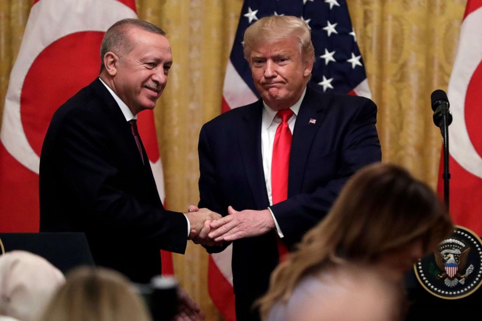 PHOTO: President Donald Trump shakes hands with Turkish President Recep Tayyip Erdogan after a news conference in the East Room of the White House, Nov. 13, 2019, in Washington.