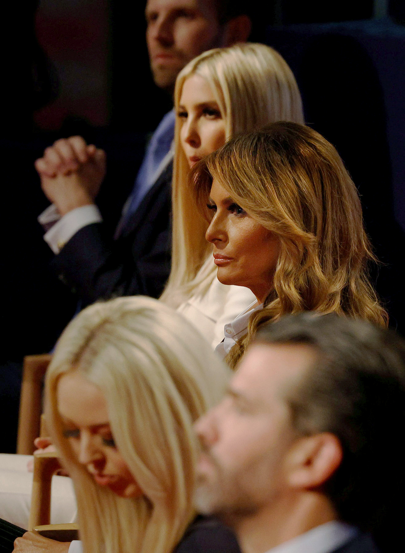 PHOTO: First lady Melania Trump watches after taking off her face mask while sitting with the rest of the Trump family, including Donald Trump Jr., Tiffany Trump, Ivanka Trump and Eric Trump, before the start of the presidential campaign debate.