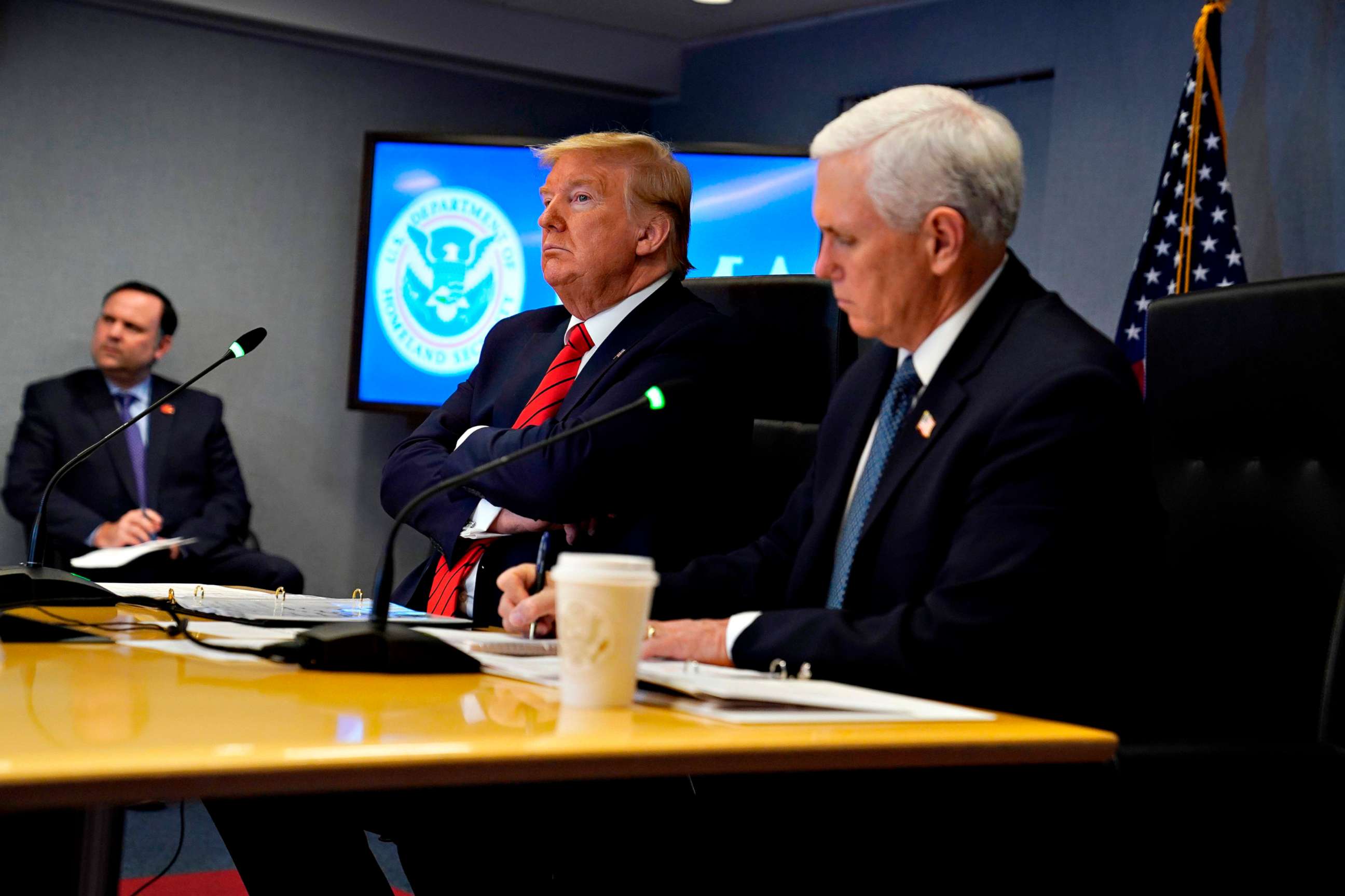 PHOTO: President Donald Trump and Vice President Mike Pence attend a teleconference with governors at the Federal Emergency Management Agency (FEMA) headquarters, March 19, 2020, in Washington. 