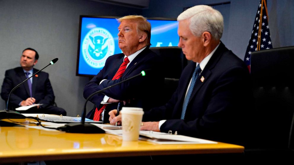 PHOTO: President Donald Trump and Vice President Mike Pence attend a teleconference with governors at the Federal Emergency Management Agency (FEMA) headquarters, March 19, 2020, in Washington. 