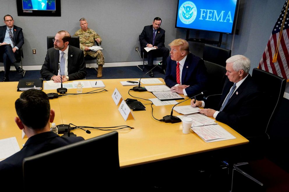 PHOTO: President Donald Trump and Vice President Mike Pence attend a teleconference with governors at the Federal Emergency Management Agency(FEMA) headquarters, March 19, 2020, in Washington, D.C. 
