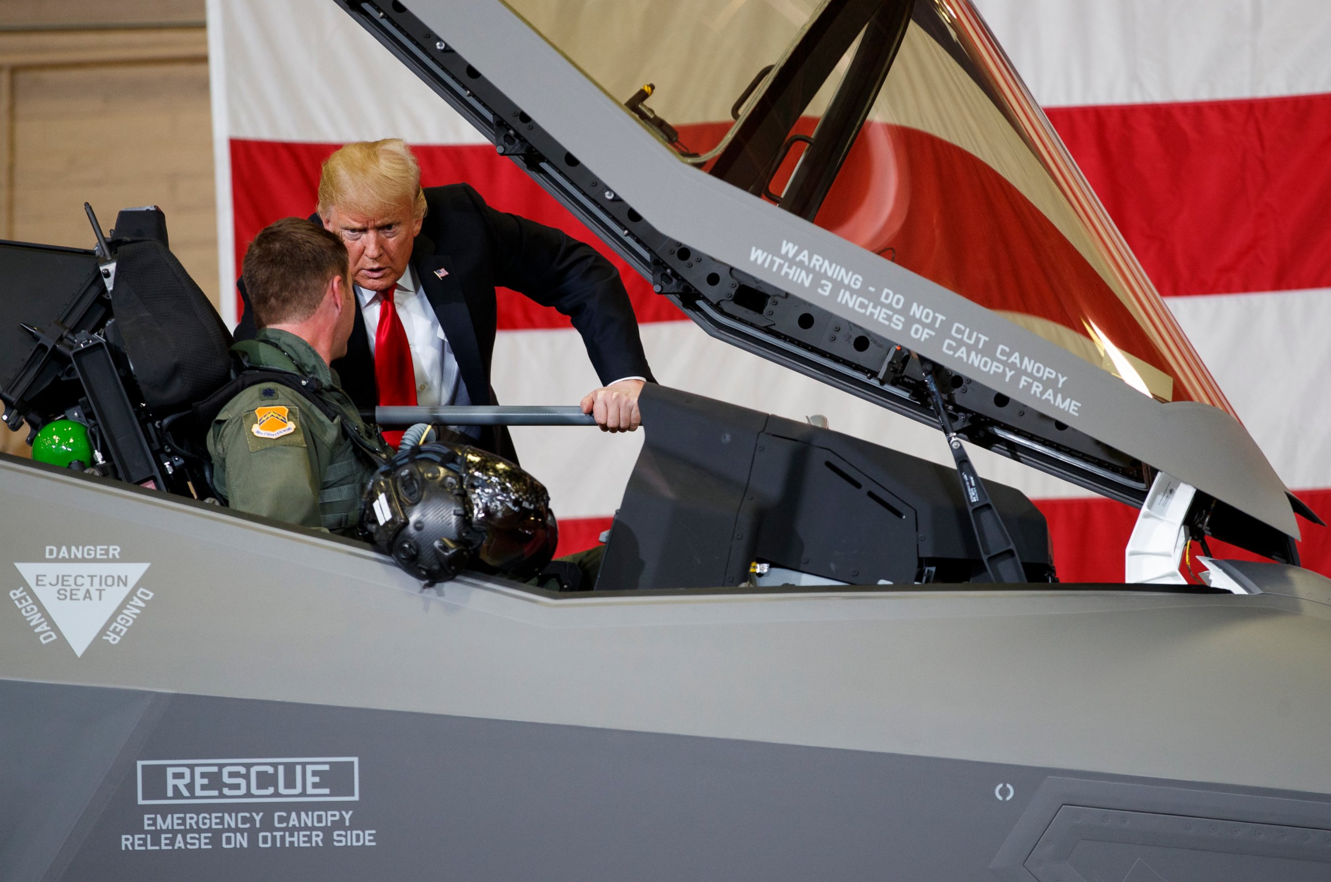 PHOTO: President Donald Trump talks to a pilot in the cockpit of an F-35 aircraft during a Defense Capability Tour at Luke Air Force Base, Ariz., Friday, Oct. 19, 2018. 