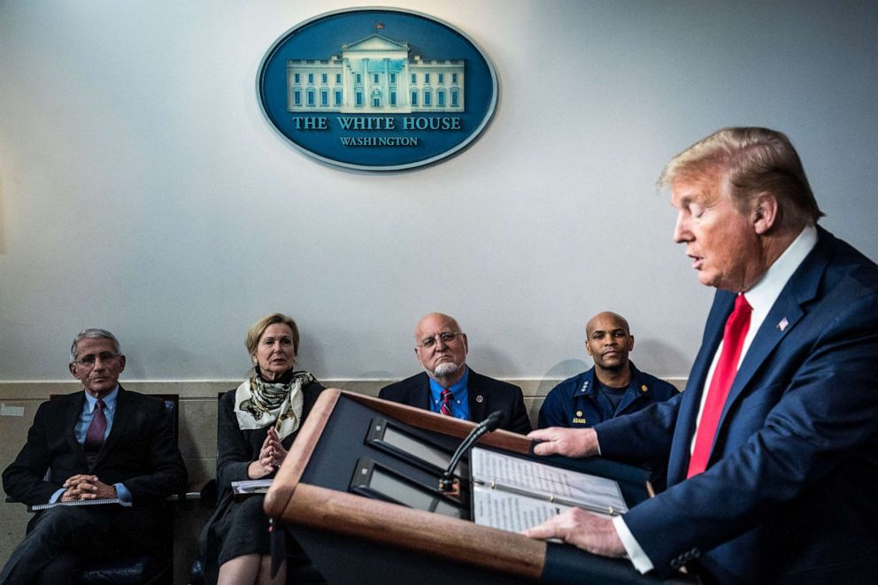 PHOTO: President Donald Trump speaks with members of the coronavirus task force during a briefing in response to the COVID-19 coronavirus pandemic on Wednesday, April 22, 2020 in Washington, DC.