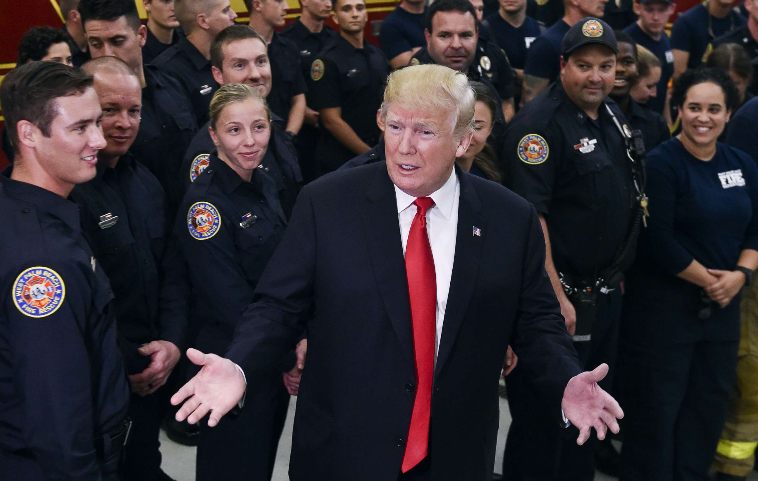PHOTO: President Donald Trump speaks to first responders at West Palm beach Fire rescue in West Palm Beach, Fla., Dec. 27, 2017. 