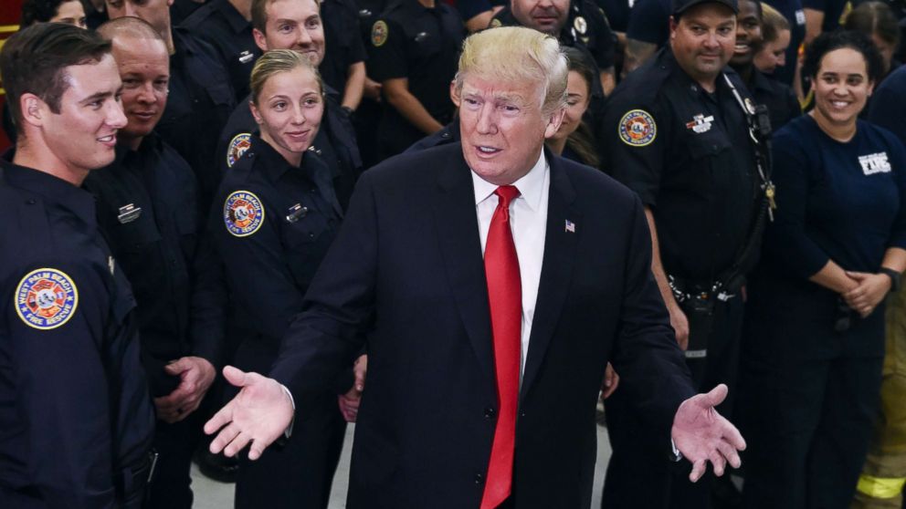 PHOTO: President Donald Trump speaks to first responders at West Palm beach Fire rescue in West Palm Beach, Fla., Dec. 27, 2017. 
