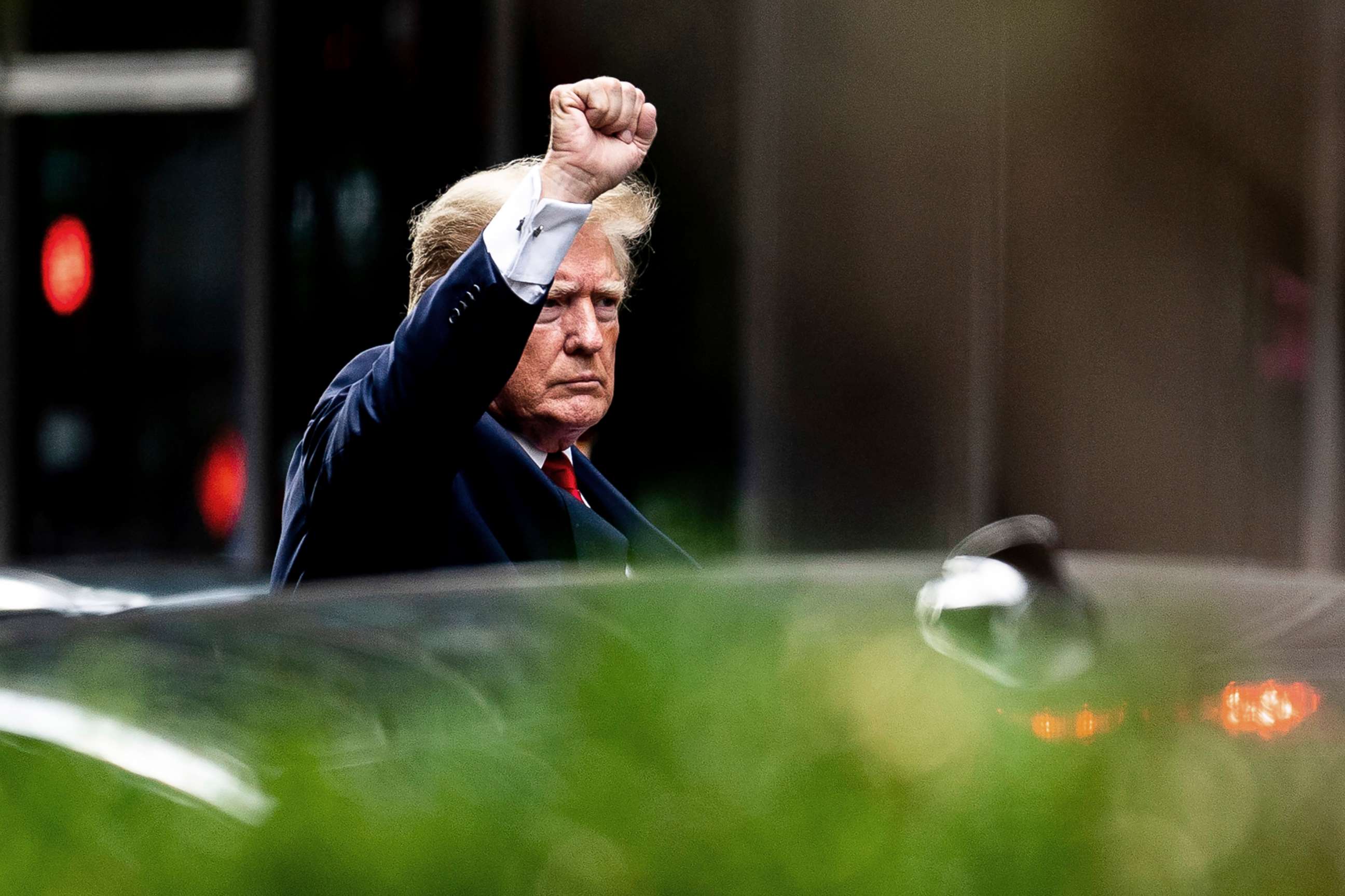 PHOTO: Former President Donald Trump gestures as he departs Trump Tower, Aug. 10, 2022, in New York, on his way to the New York attorney general's office for a deposition in a civil investigation.