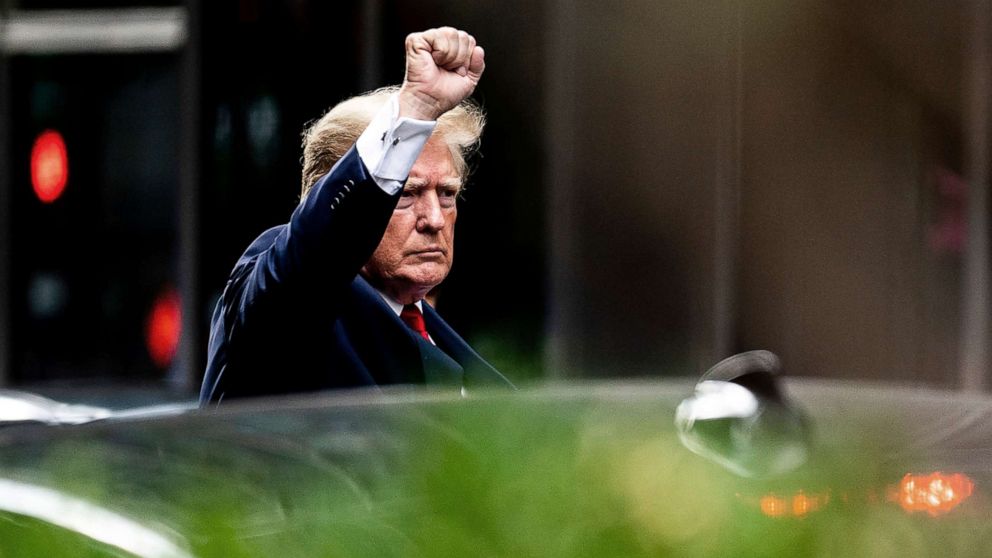PHOTO: Former President Donald Trump gestures as he departs Trump Tower, Aug. 10, 2022, in New York, on his way to the New York attorney general's office for a deposition in a civil investigation.