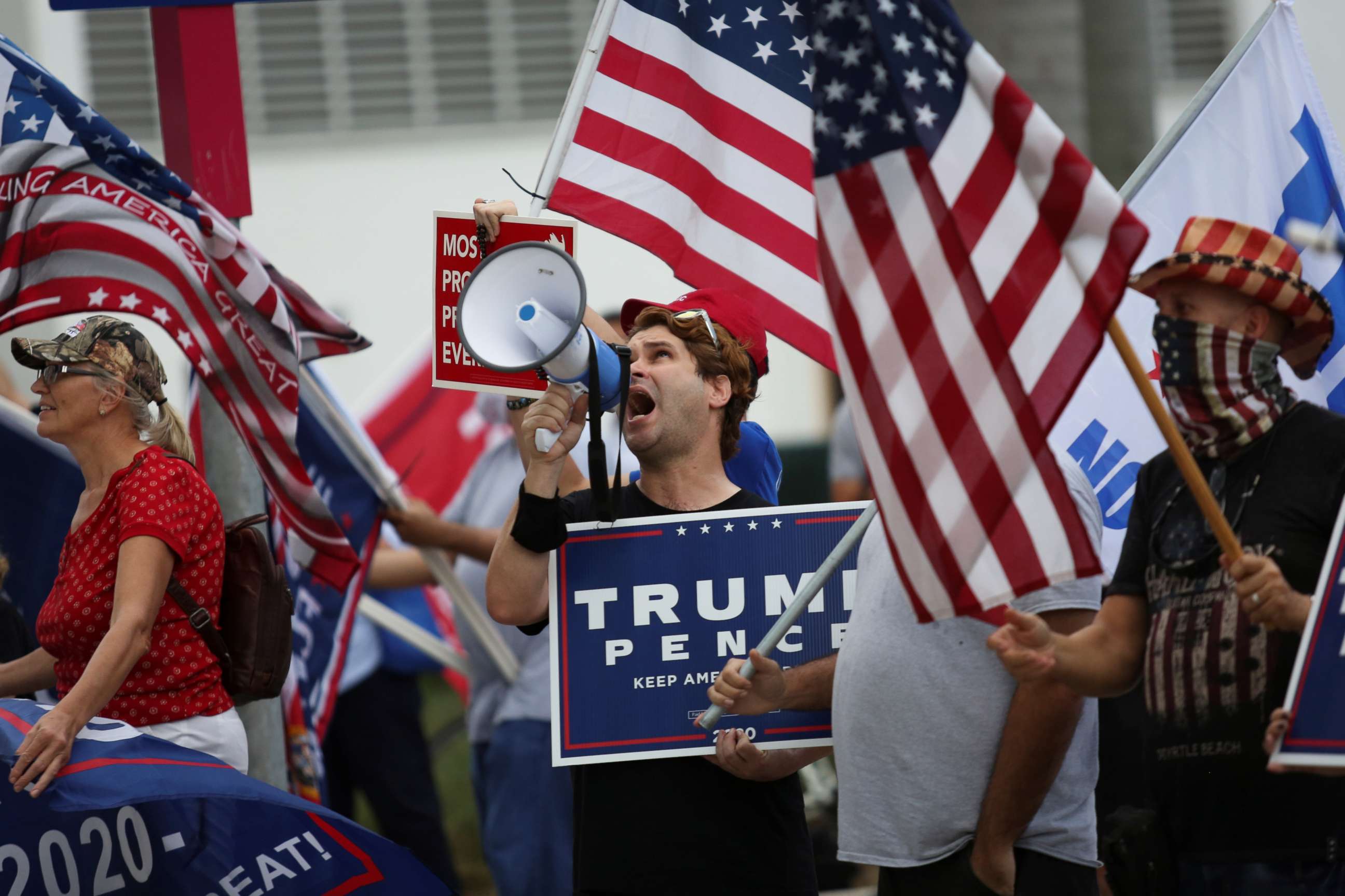 PHOTO: Supporters of President Donald Trump gather outside Perez Art Museum before his arrival for a town hall in Miami, Oct. 15, 2020.