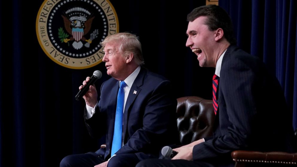 PHOTO: Charlie Kirk, founder of Turning Point USA, laughs after President Donald Trump said that if he could go back in time and give himself advice at age 25 it would be to not run for president, during a youth forum at the White House, March 22, 2018.