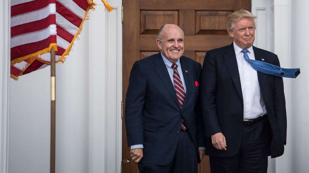PHOTO: A file photo shows President Donald Trump greeting Rudy Giuliani at the clubhouse at Trump National Golf Club Bedminster in Bedminster Township, N.J., Nov. 20, 2016.