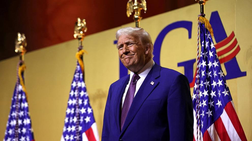 PHOTO: President Donald Trump walks on stage to speak during a meeting of the Republican Governors Association at the National Building Museum in Washington, D.C., Feb. 20, 2025.
