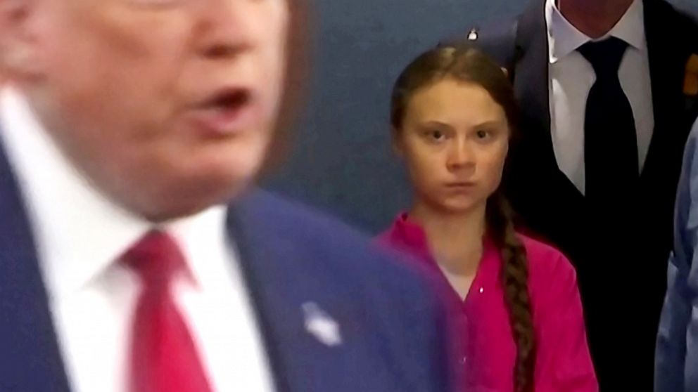 PHOTO: Swedish environmental activist Greta Thunberg watches as President Donald Trump enters the United Nations to speak with reporters in a still image from video taken in New York, Sept. 23, 2019.