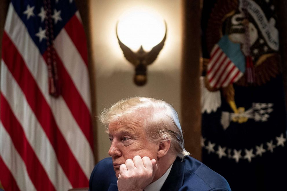 PHOTO: President Donald Trump listens during a meeting in the Cabinet Room of the White House in Washington, Nov. 22, 2019.