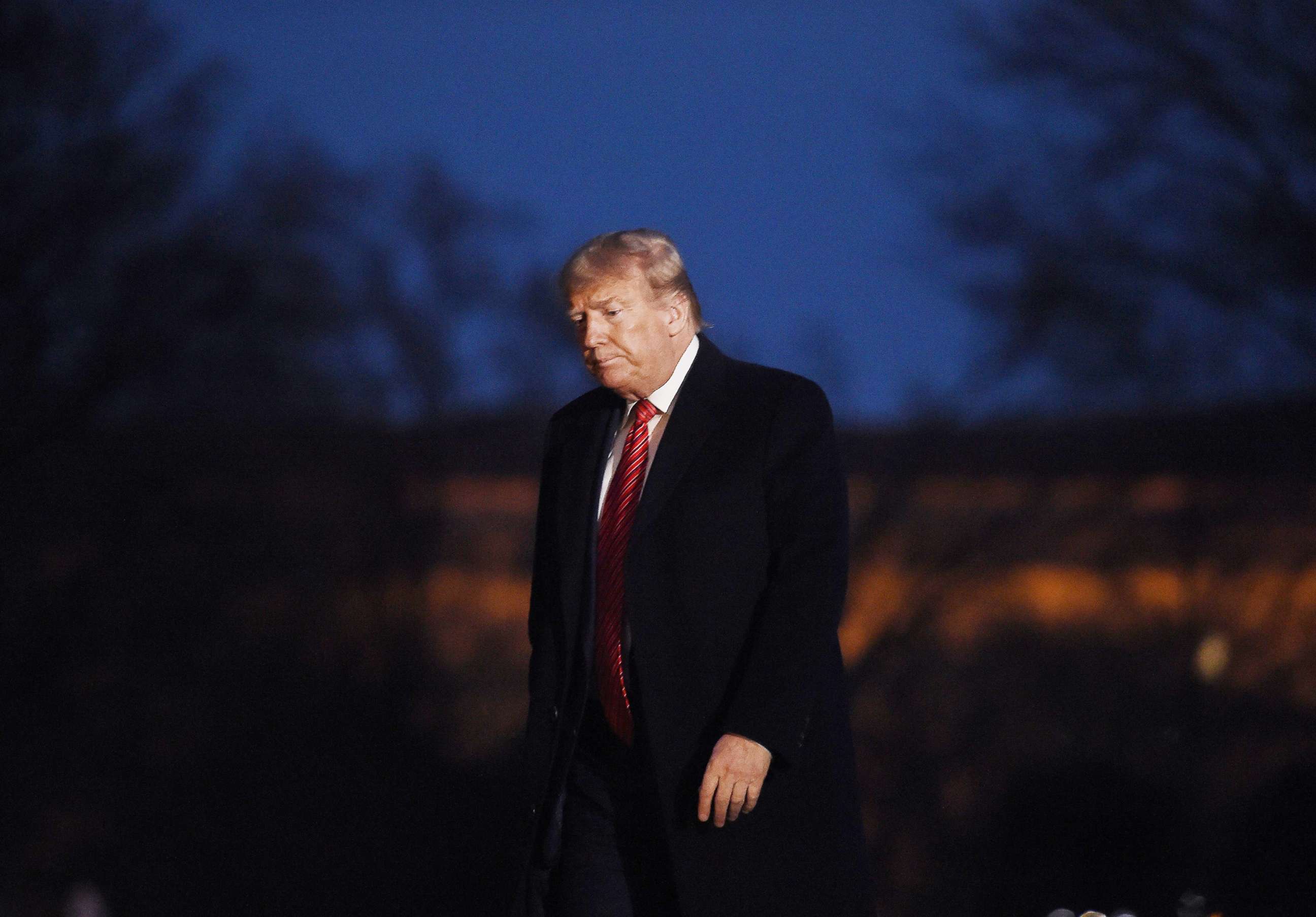 PHOTO: President Donald Trump walks on the South Lawn upon his return to the White House in Washington, on Feb. 16, 2020.
