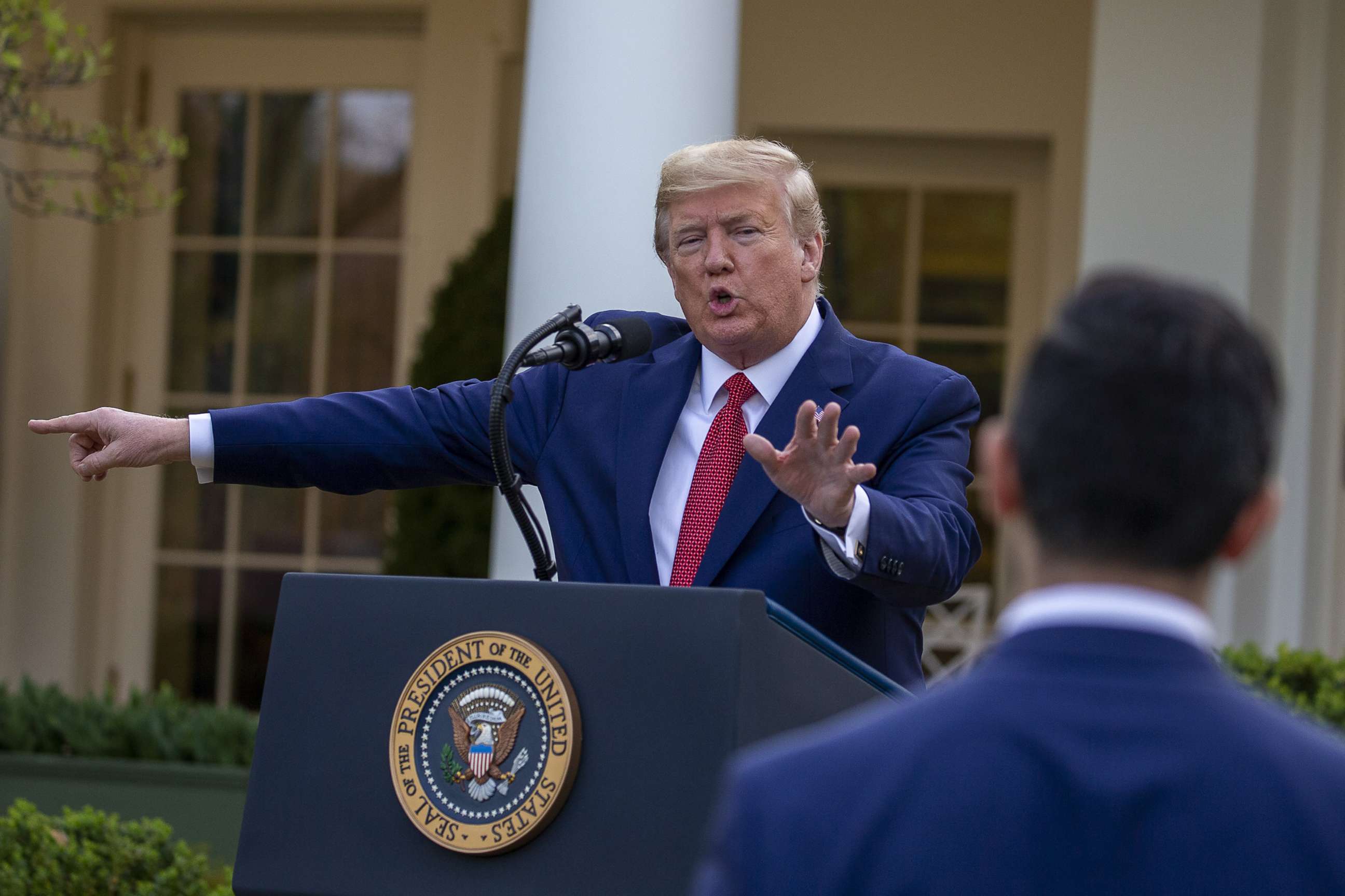 PHOTO: President Donald Trump takes questions from reporters in the Rose Garden for the daily coronavirus briefing at the White House, March 29, 2020 in Washington.