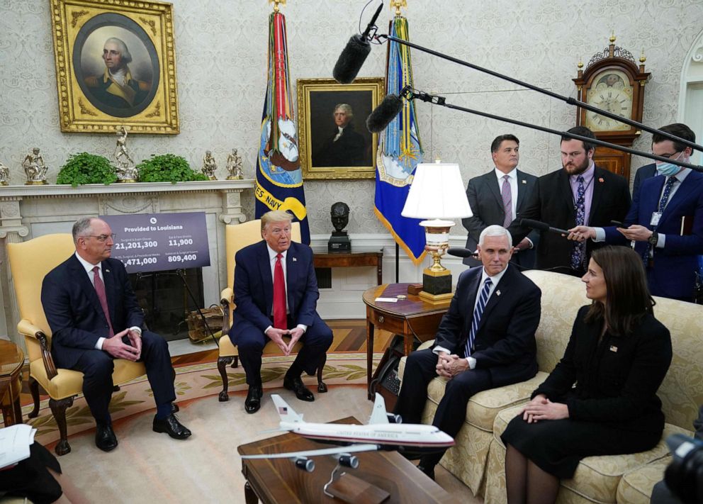PHOTO: President Donald Trump meets with Louisiana Governor John Bel Edwards in the Oval Office of the White House in Washington, on April 29, 2020 as Vice President Mike Pence.