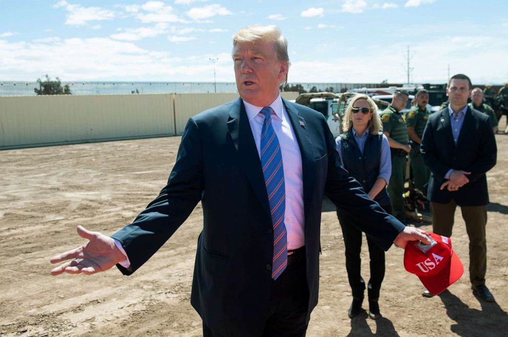 PHOTO: On April 5, 2019, President Donald Trump meets with members of the US Customs and Border Patrol during his visit to the border wall between the United States and Mexico, in Calexico, California.