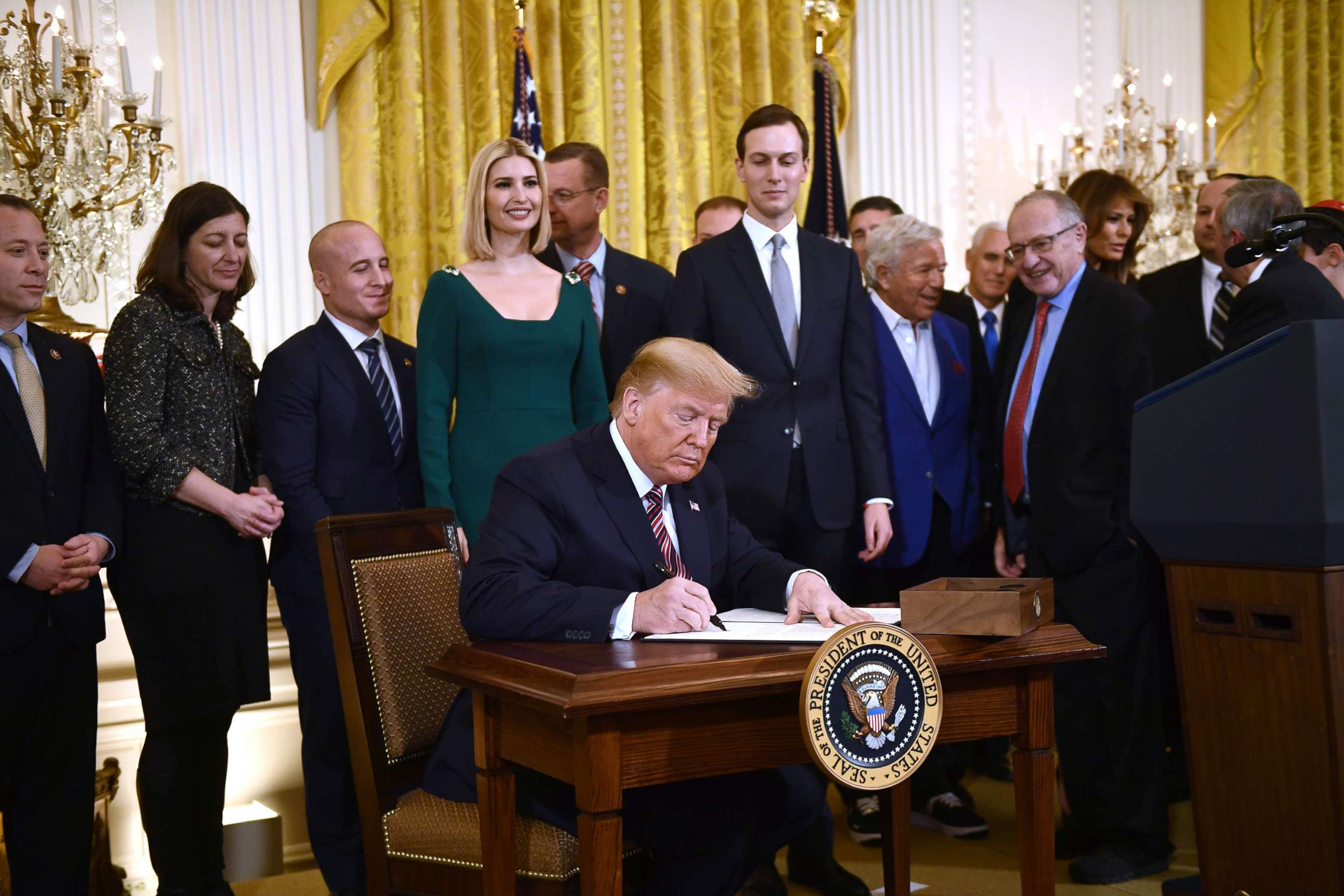 PHOTO: President Donald Trump signs an Executive Order to further the fight against the rise of anti-Semitism in the U.S., at a Hanukkah reception at the White House, Dec. 11, 2019, in Washington.